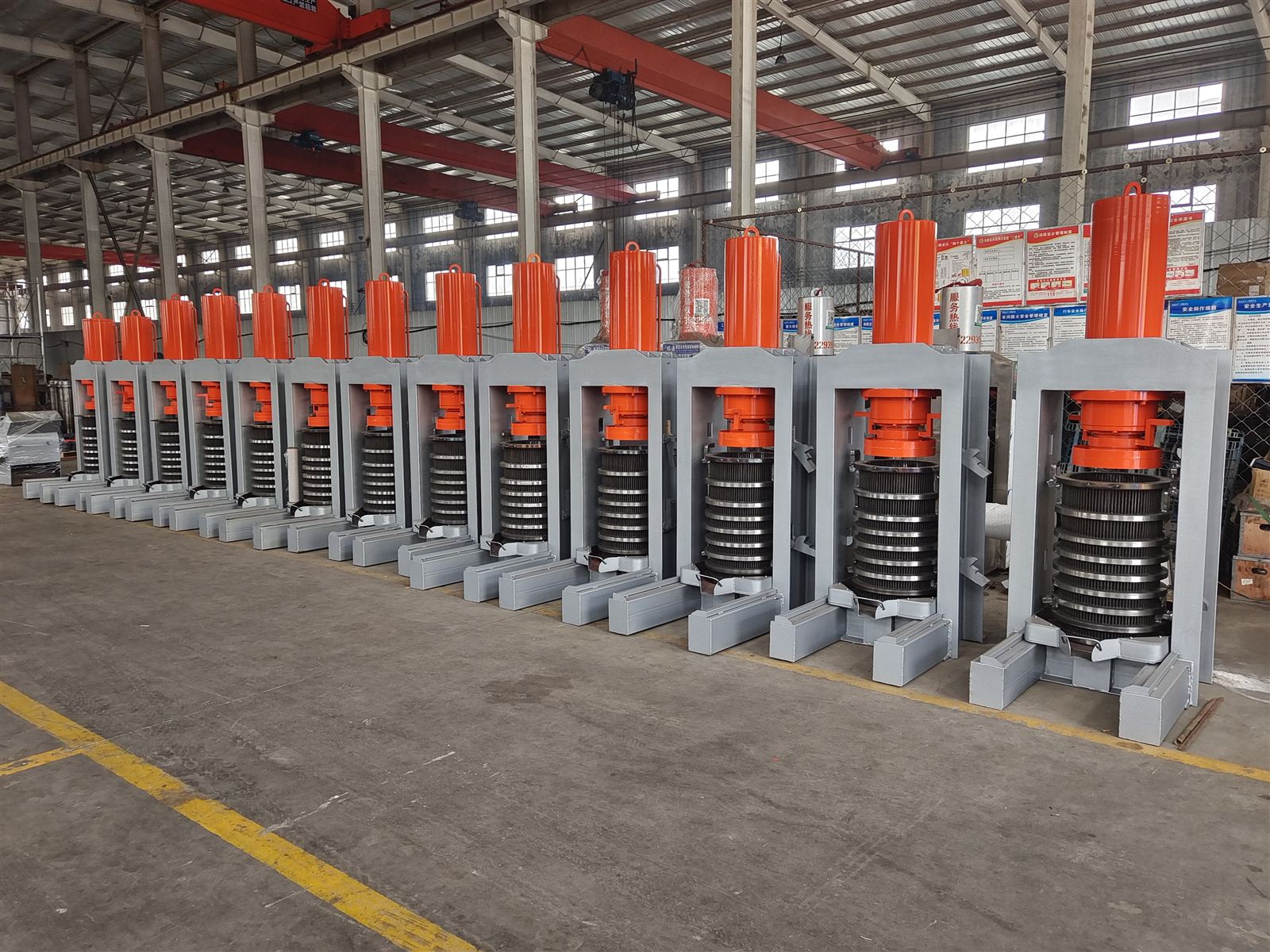 Rows of hydraulic oil presses in the Haonuo assembly workshop